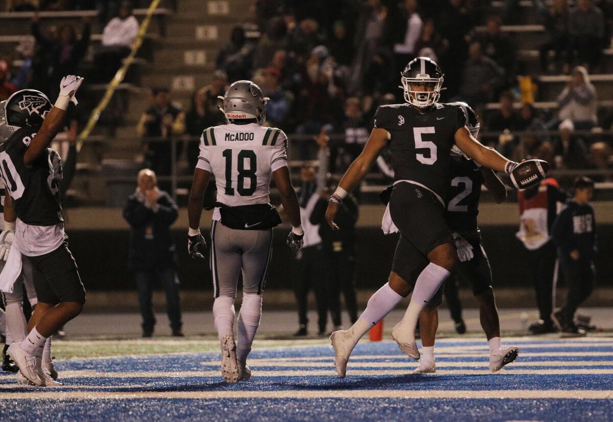 St. John Bosco quarterback DJ Uiagalelei scores on a keeper against Concord De La Salle