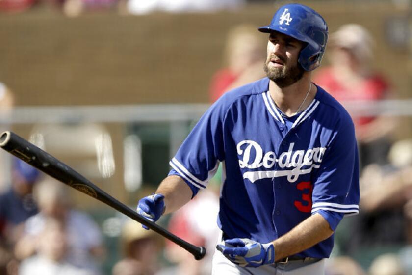 Scott Van Slyke, heading to first base after drawing a walk in an exhibition game, is likely to start in left field for the Dodgers when they open the regular season against the Diamondbacks in Australia next week.