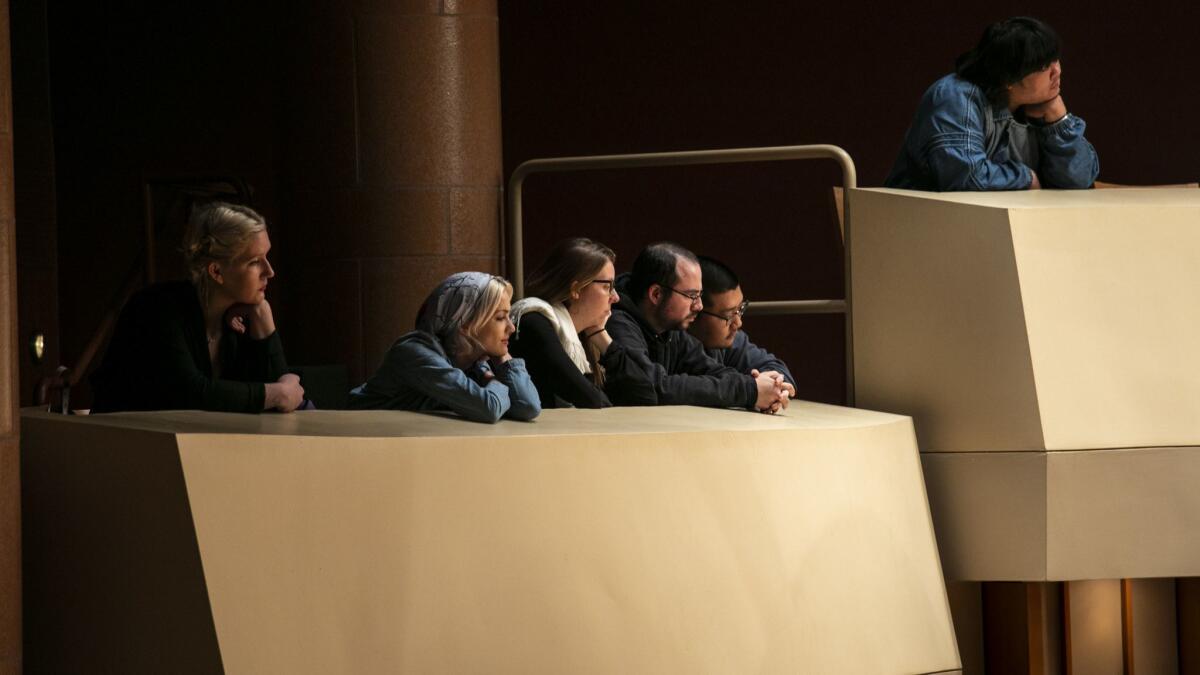 Audience members listen to a Monday Evening Concerts ensemble perform Julius Eastman's "Femenine (1974)."