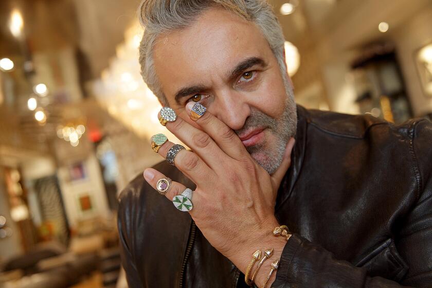 L.A.-based interior designer Martyn Lawrence Bullard is branching out into fine jewelry. “I like bling-bling,” says the author and TV personality, who shows off an assortment of unisex rings he designed.