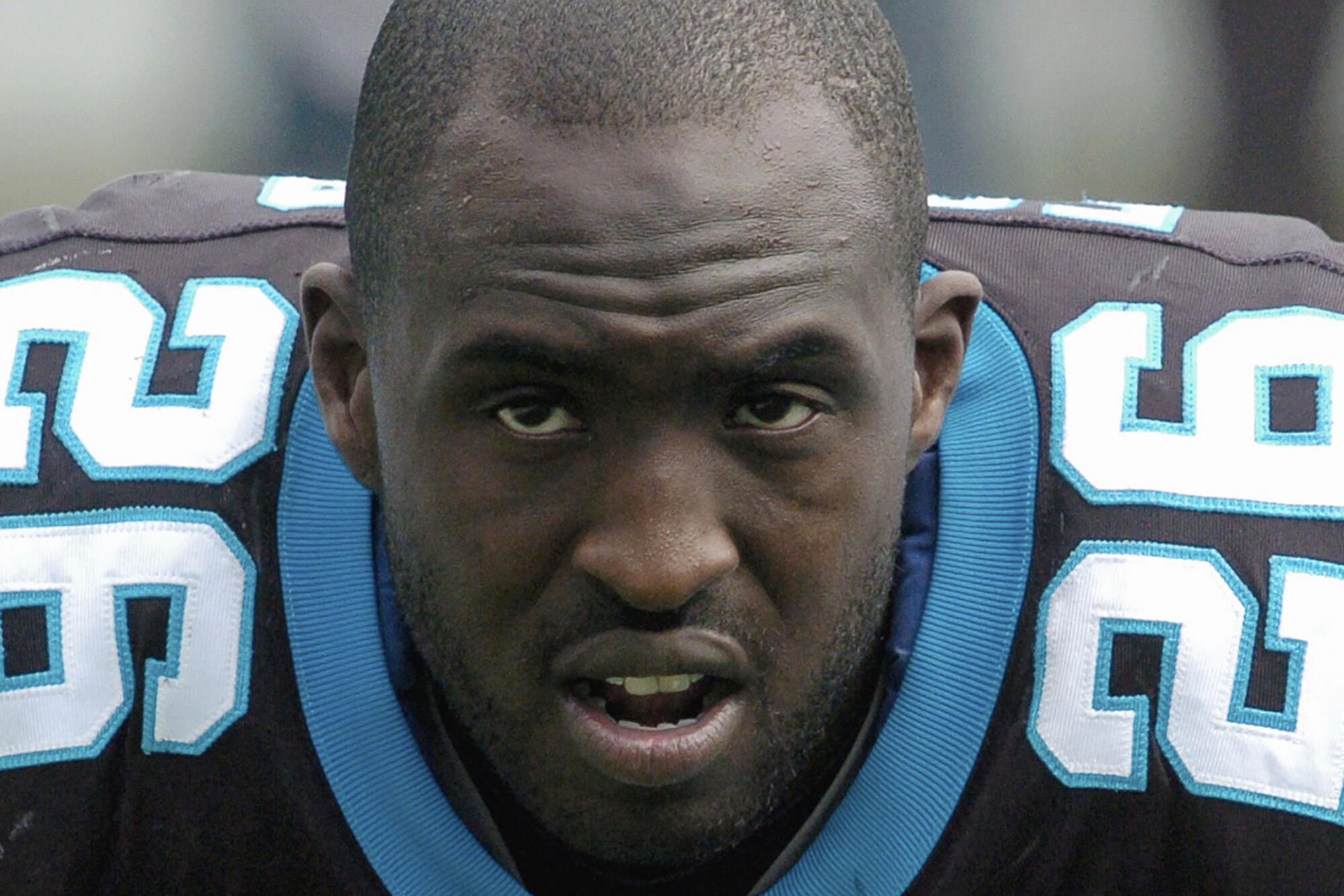 Carolina Panthers' DeShaun Foster (26)