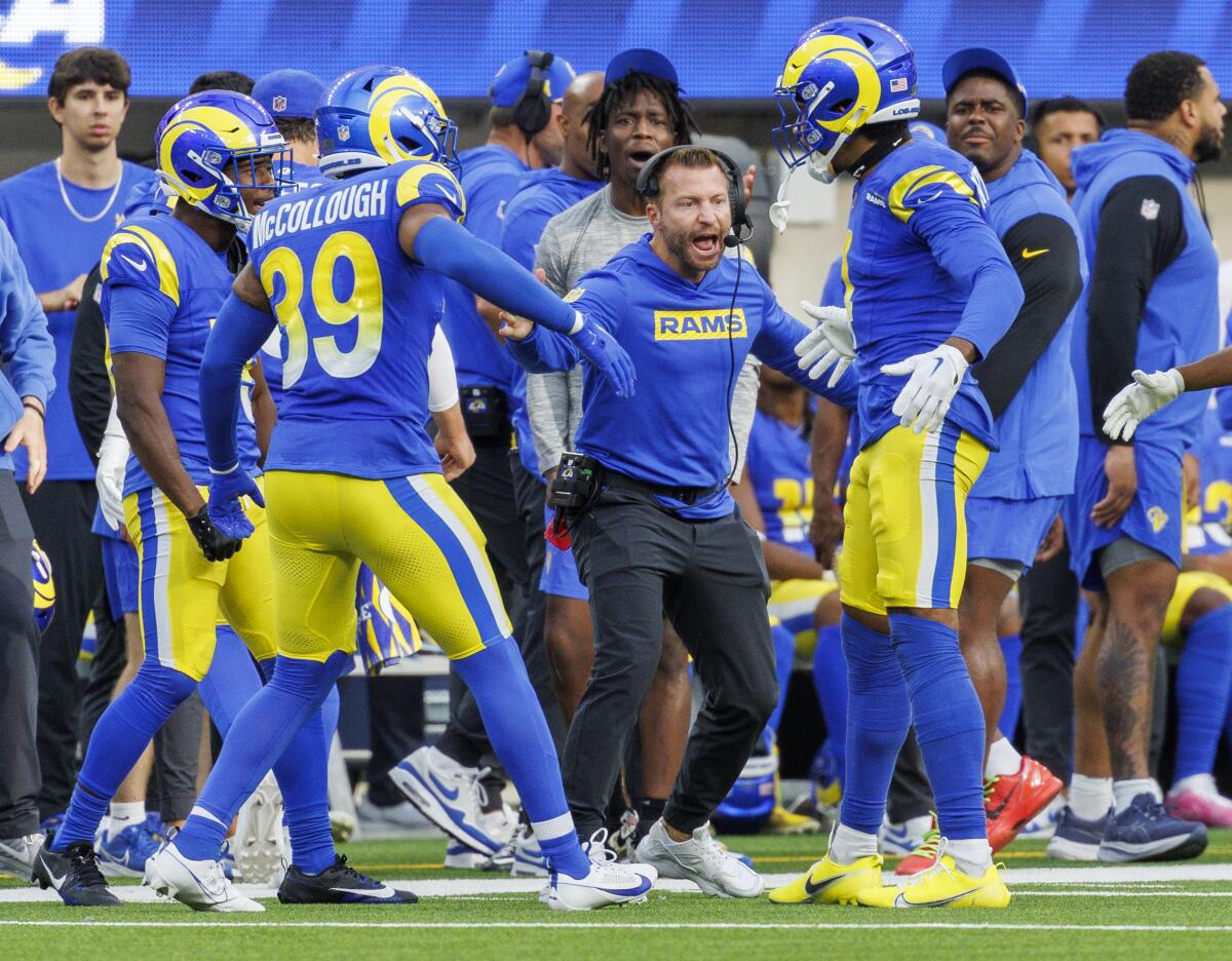 Rams safety Jaylen McCollough (39) is congratulated after his second interception sealed a win over the Raiders.