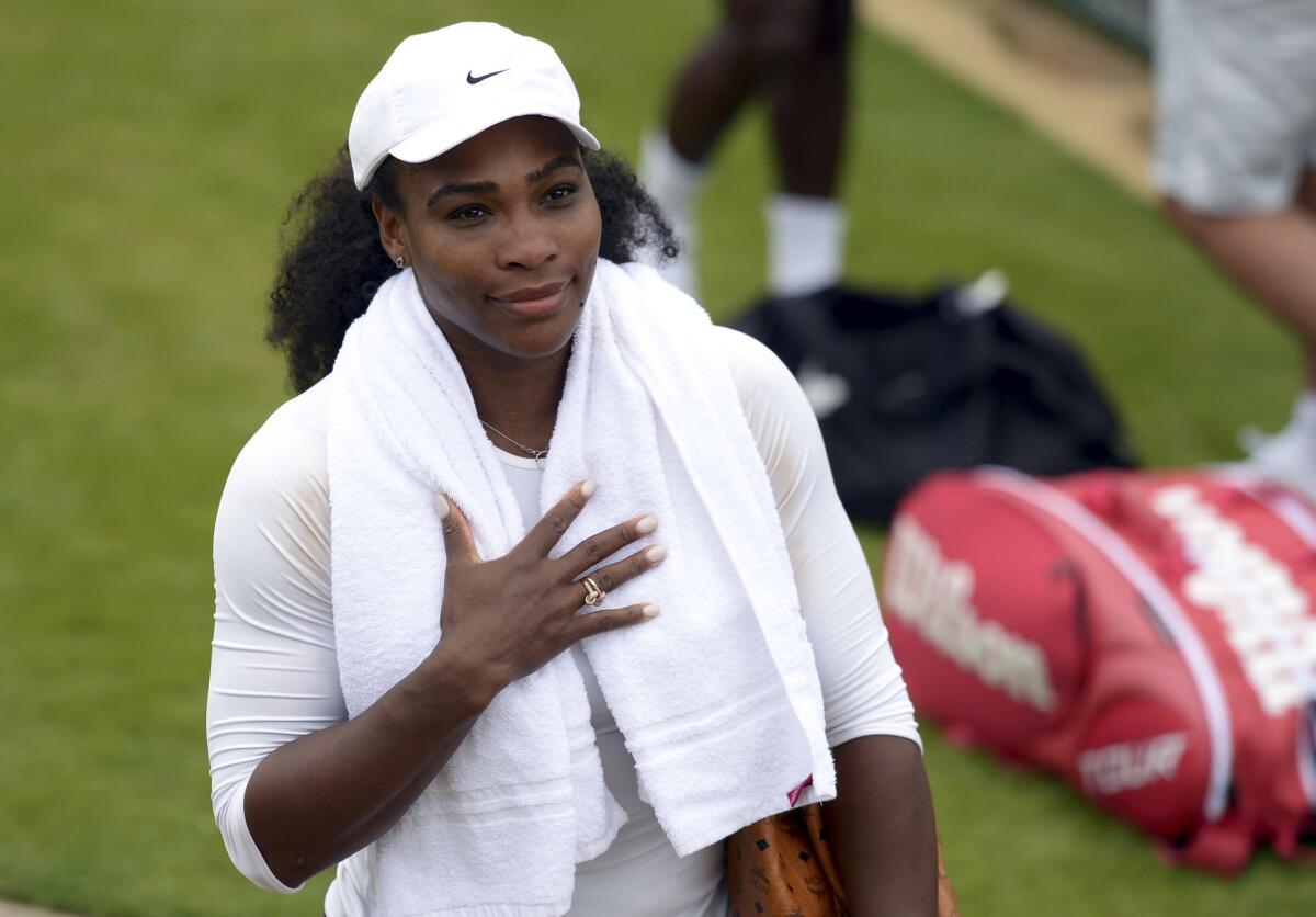 Serena Williams arrives for a practice session at the at the All England Lawn Tennis and Croquet Club in Wimbledon on Sunday.