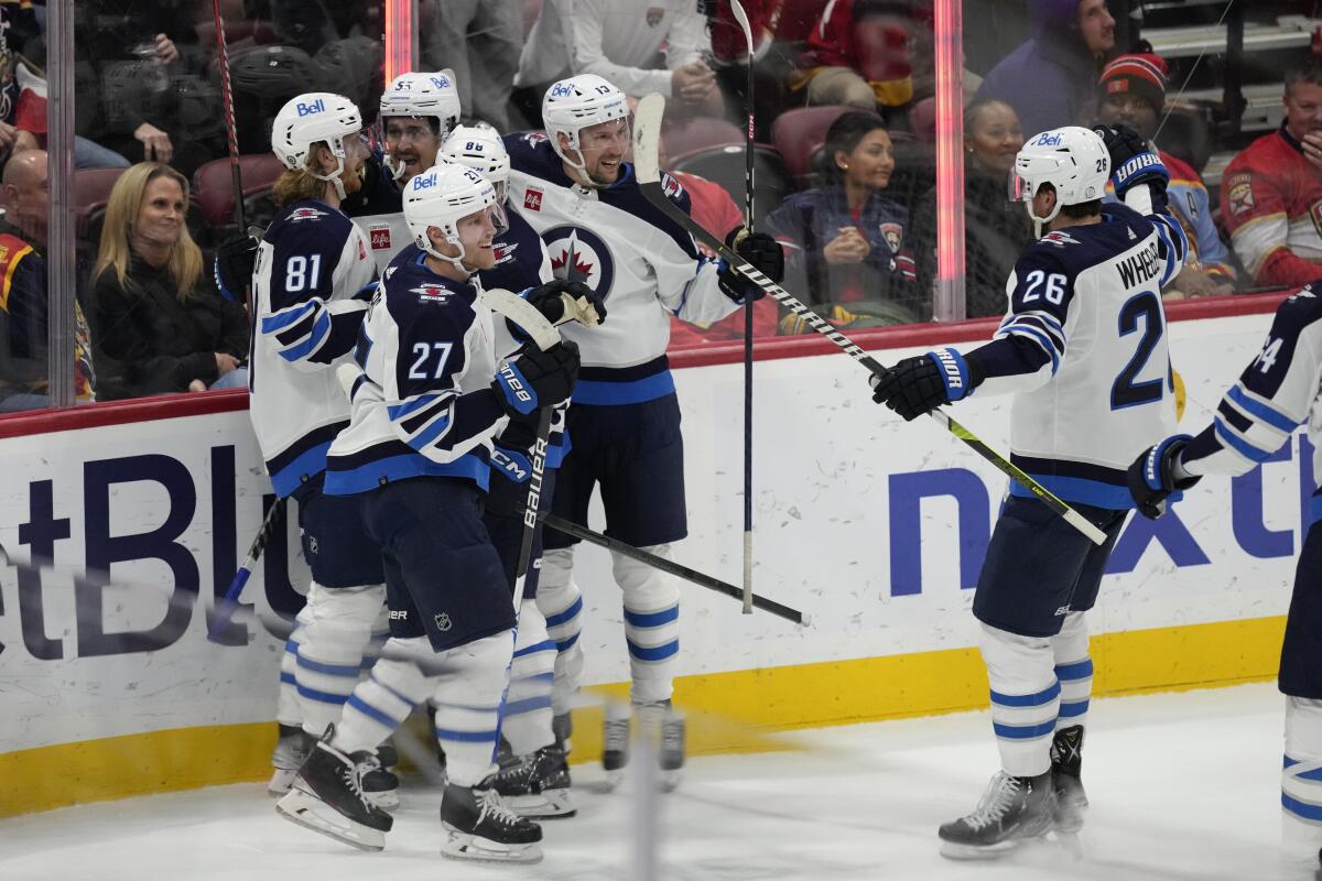 Mark Scheifele scores in OT, Jets beat Panthers 5-4 - The San Diego  Union-Tribune