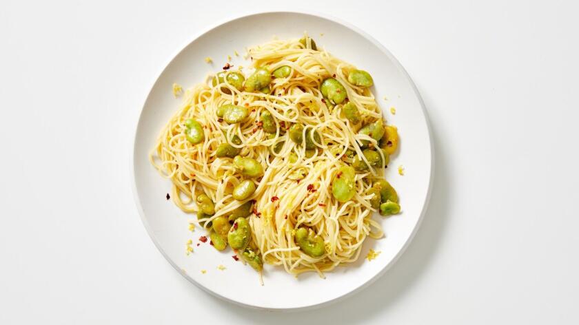 A bowl of spaghetti, fava beans, lemon, chile flakes and wine in a vegetarian spin on scampi pasta