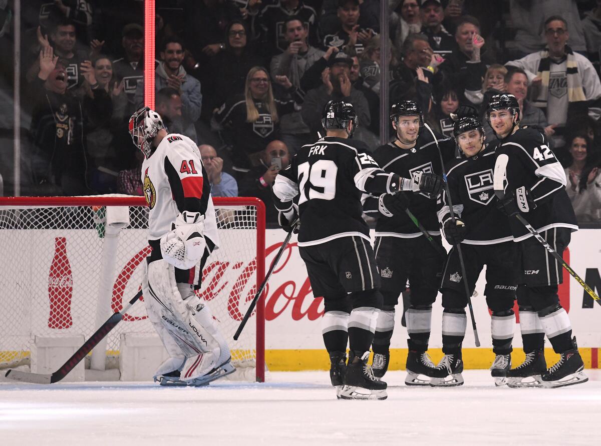 LOS ANGELES, CALIFORNIA - MARCH 11: Gabriel Vilardi #42 of the Los Angeles Kings celebrates his goal with Trevor Moore #12, Matt Roy #3 and Martin Frk #29, to tie the game 2-2 on Craig Anderson #41 of the Ottawa Senators, during the third period in a 3-2 Kings win at Staples Center on March 11, 2020 in Los Angeles, California. (Photo by Harry How/Getty Images)
