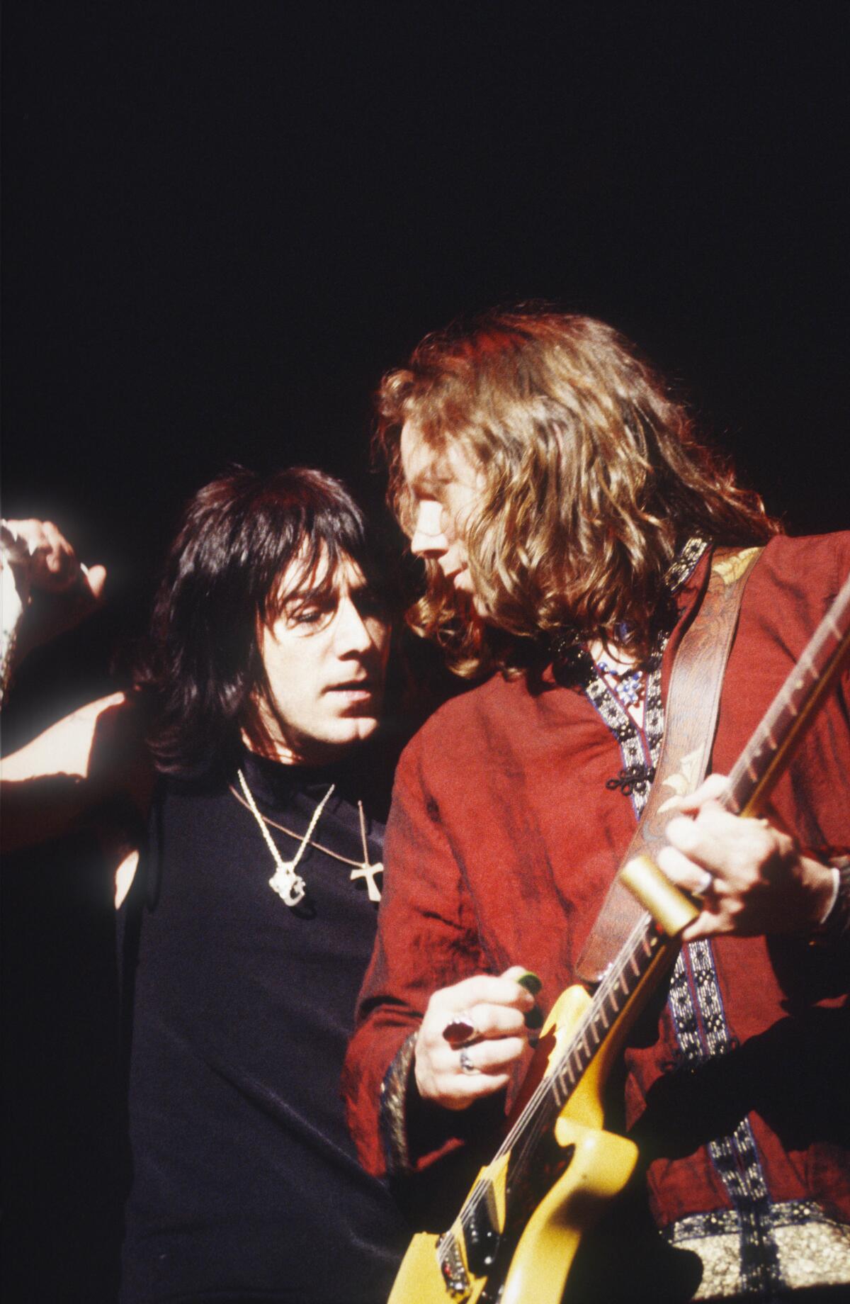 The Black Crowes' Chris and Rich Robinson performing in 1999.