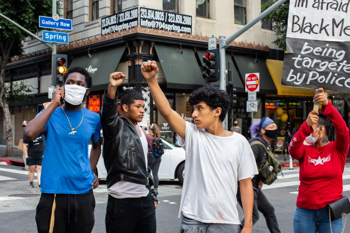 Members of the Black Future Project run through protest drills at their occupation camp in downtown Los Angeles.