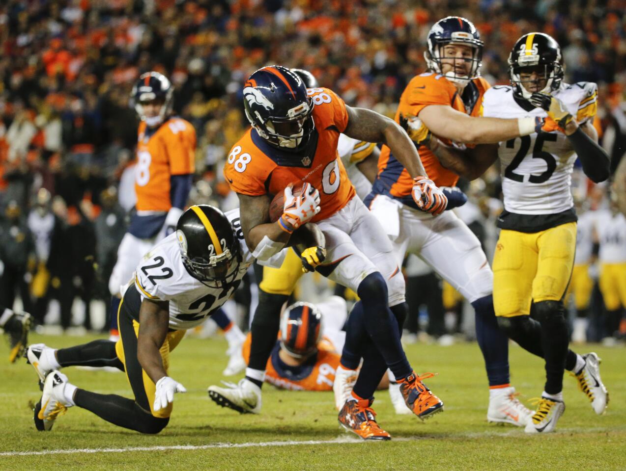 Denver Broncos wide receiver Demaryius Thomas scores the two-point conversion against the Pittsburgh Steelers during the second half in an NFL football divisional playoff game, Sunday, Jan. 17, 2016, in Denver. (AP Photo/Jack Dempsey)