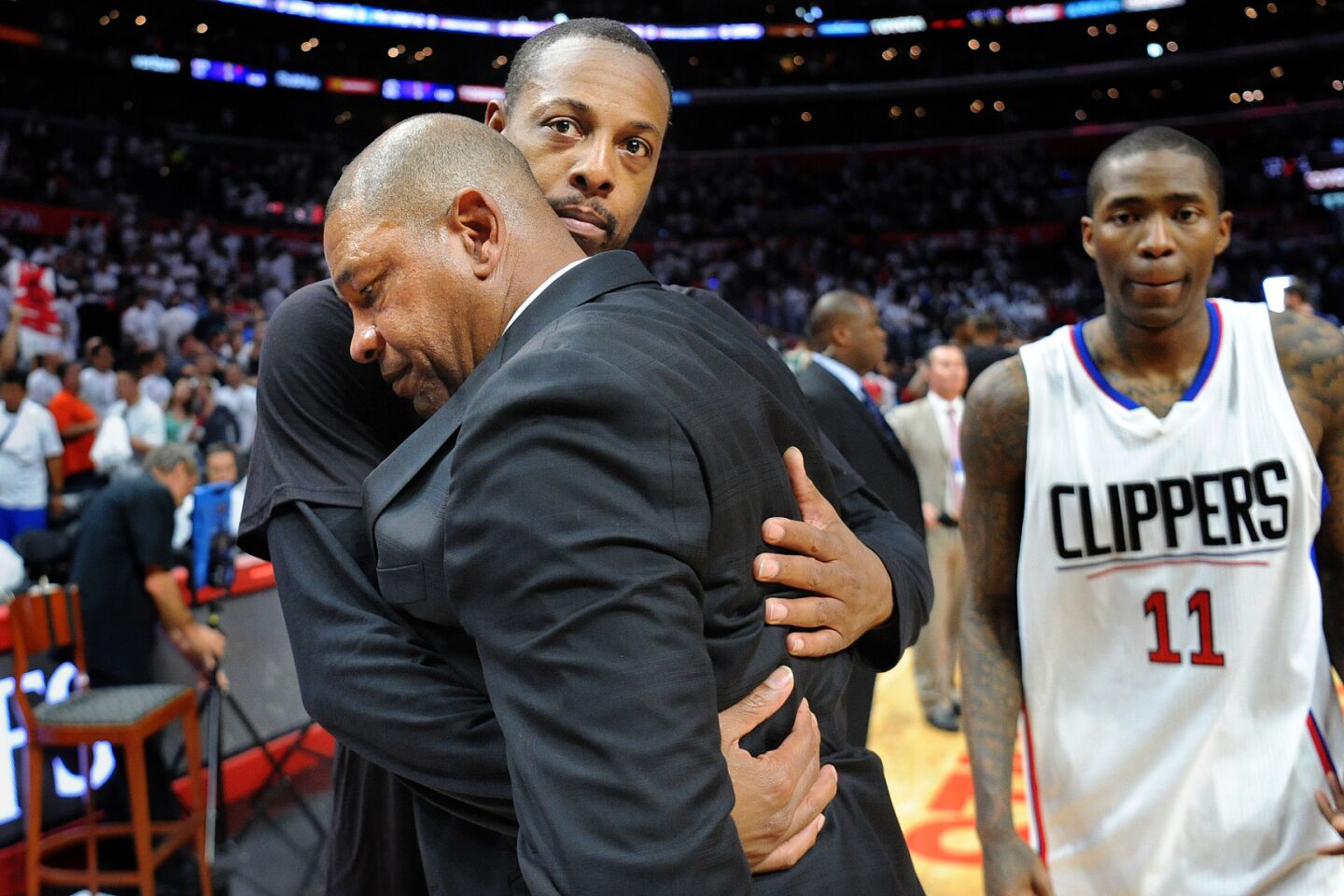 Clippers forward Paul Pierce hugs head coach Doc Rivers as Jamal Crawford walks off the court after losing to the Jazz in Game 7.