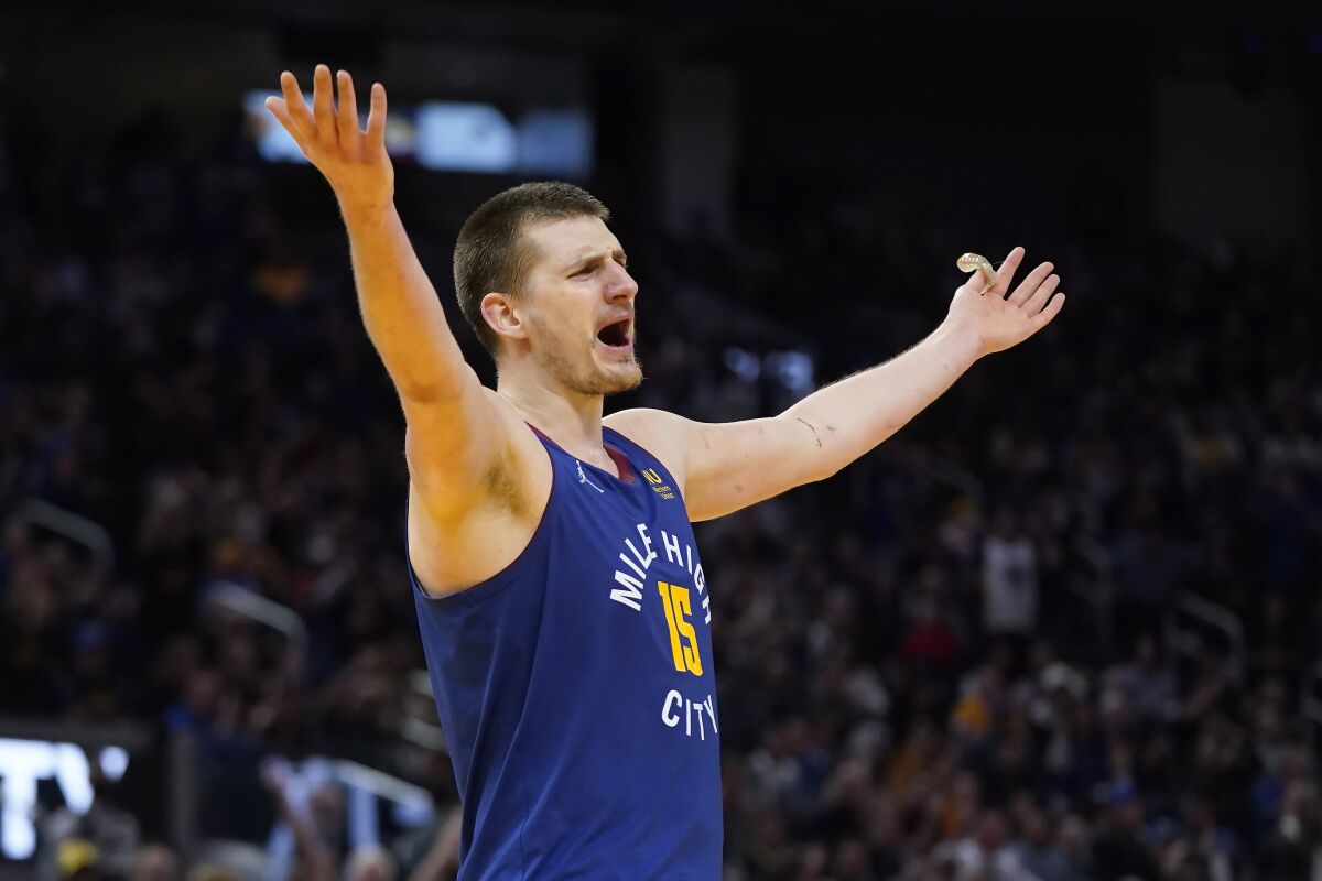 Denver Nuggets center Nikola Jokic (15) reacts after being called for a technical foul during the second half of Game 2 of an NBA basketball first-round playoff series against the Golden State Warriors in San Francisco, Monday, April 18, 2022. (AP Photo/Jeff Chiu)