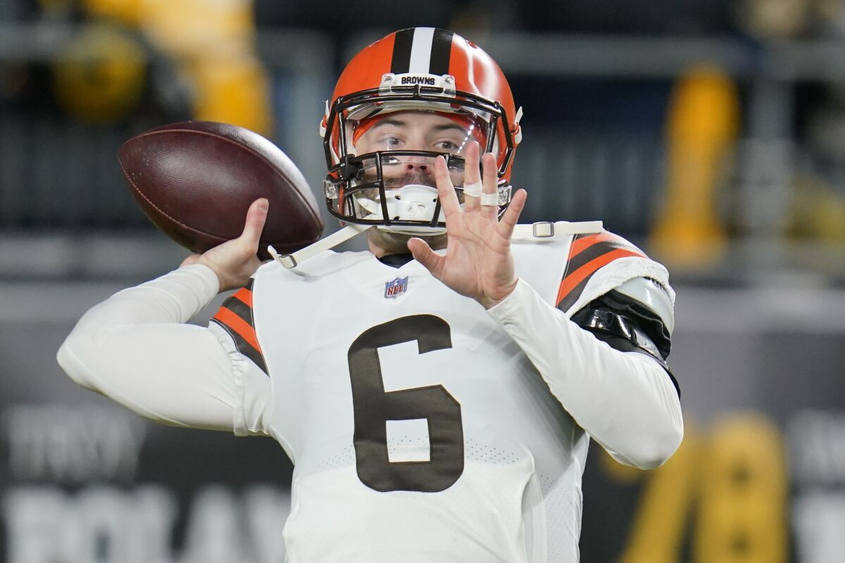 Cleveland Browns quarterback Baker Mayfield (6) warms up before an NFL football game against the Pittsburgh Steelers, Monday, Jan. 3, 2022, in Pittsburgh. Browns general manager Andrew Berry said Tuesday, Jan. 11 the team expects Mayfield to return as its starter next season and rebound after an injury-filled 2021 that raised questions about his future with Cleveland.(AP Photo/Gene J. Puskar)