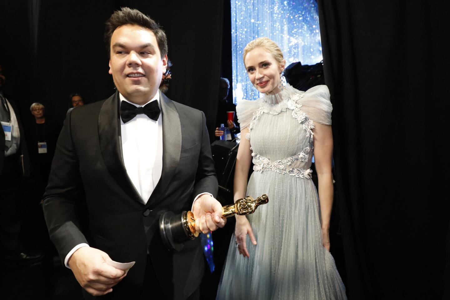 Robert Lopez and Emily Blunt backstage at the 90th Academy Awards on Sunday at the Dolby Theatre in Hollywood.