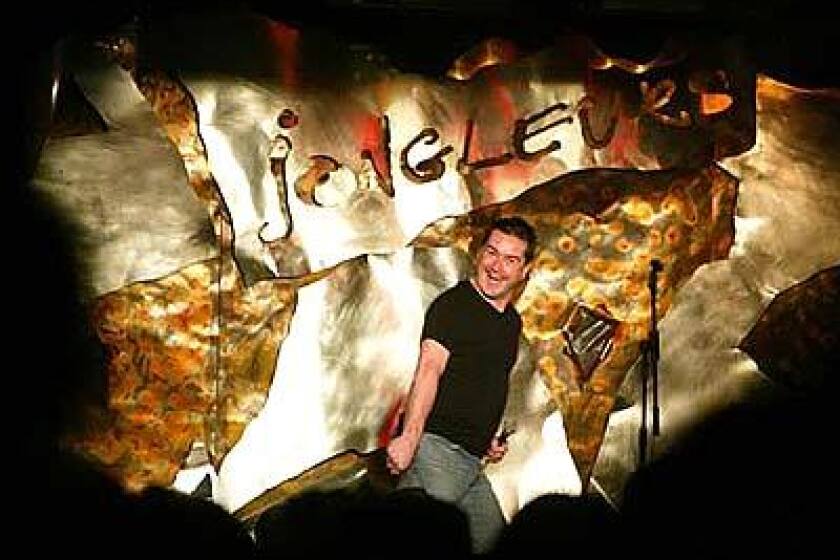 Greg Burns takes the stage at Jongleurs, a club whose formula of comedy followed by disco has proved a hit.