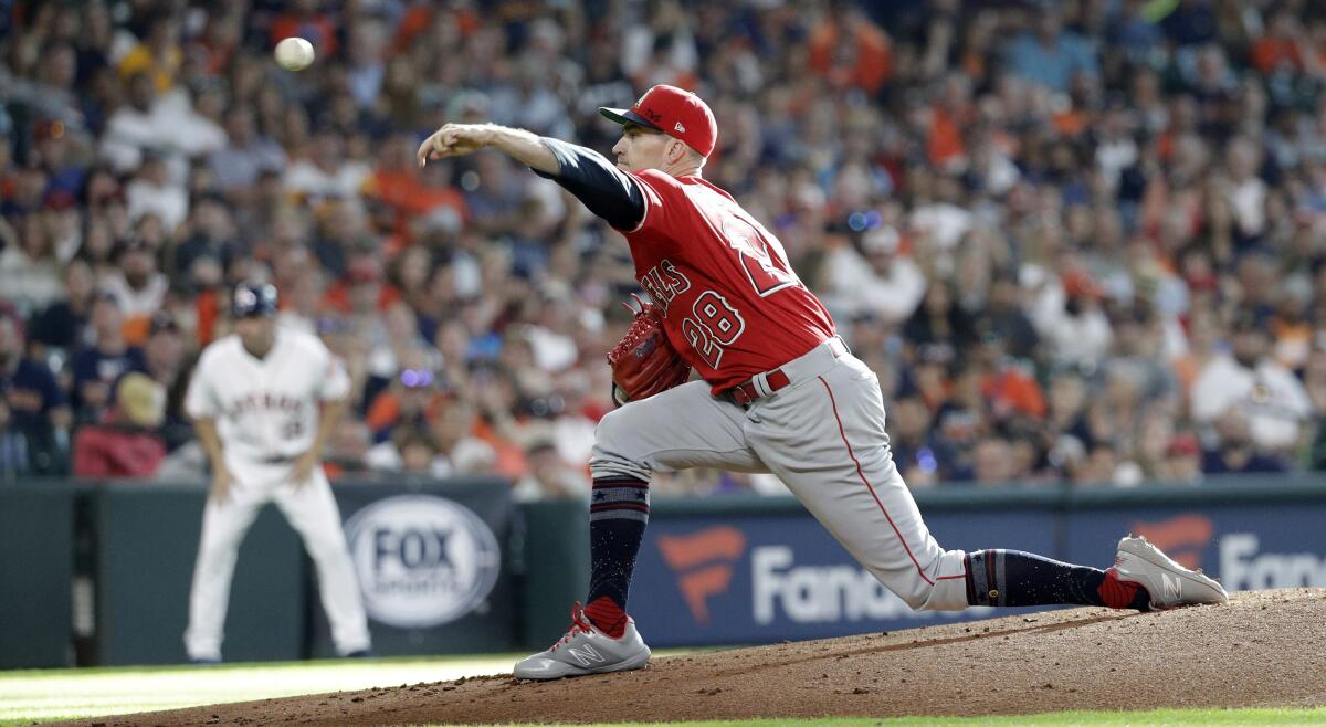 Angels starting pitcher Andrew Heaney delivers against the Houston Astros on July 6.