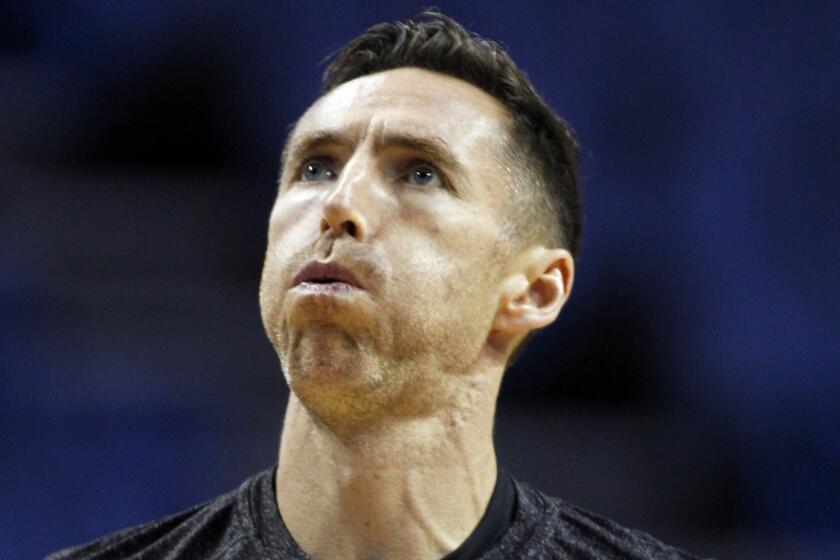 Lakers guard Steve Nash warms up before an exhibition game against the Golden State Warriors on Oct. 12.