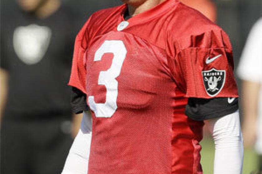 Former USC quarterback Carson Palmer has been traded from the Oakland Raiders to the Arizona Cardinals.