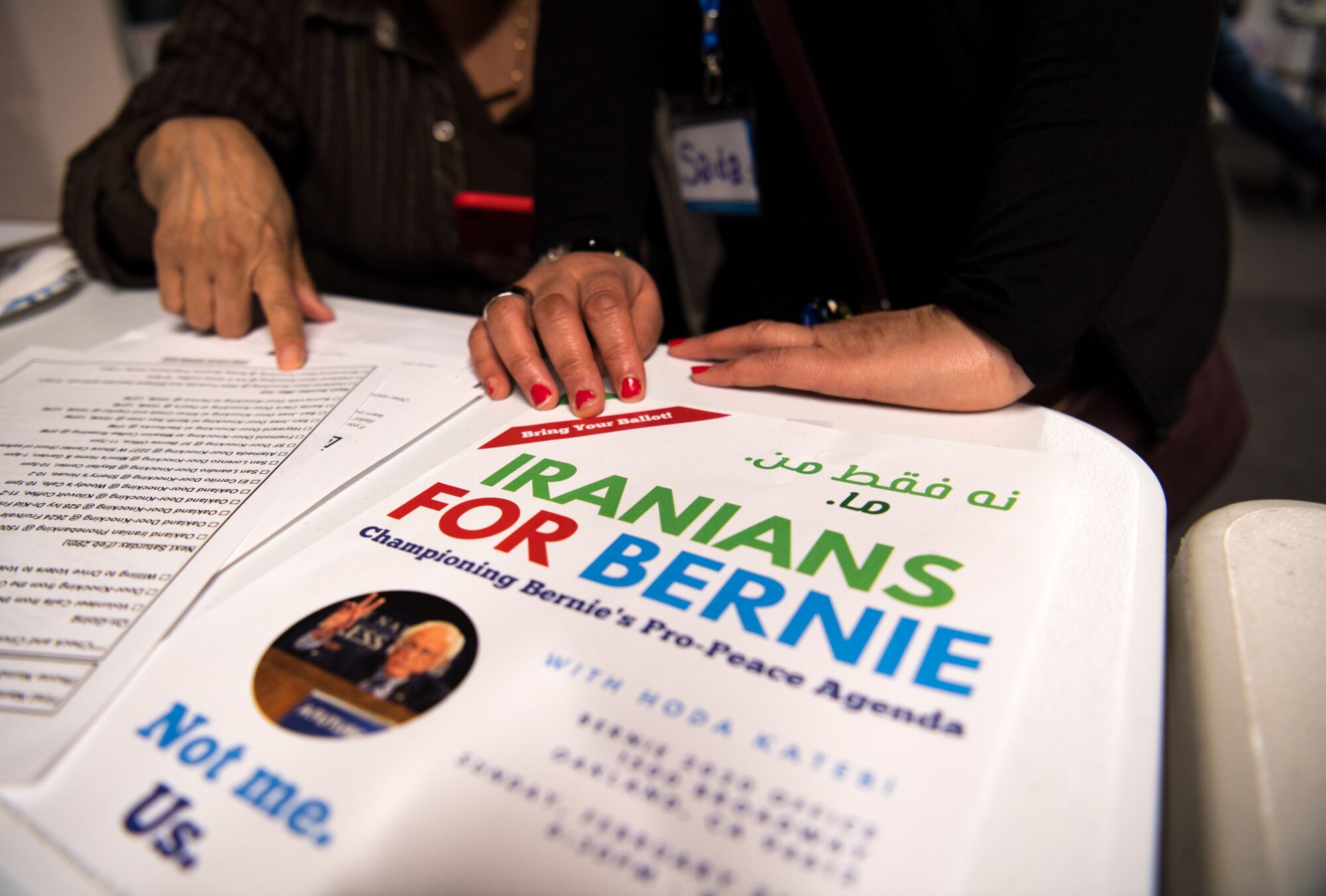 Iranian Americans gathered at an Iranians for Bernie meeting at Bernie Sanders' Oakland campaign office