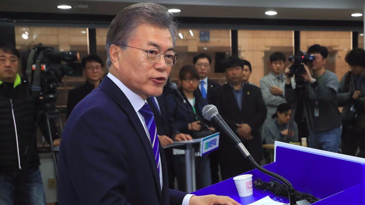 South Korean presidential candidate Moon Jae-in speaks during a news conference in Seoul on March 12.