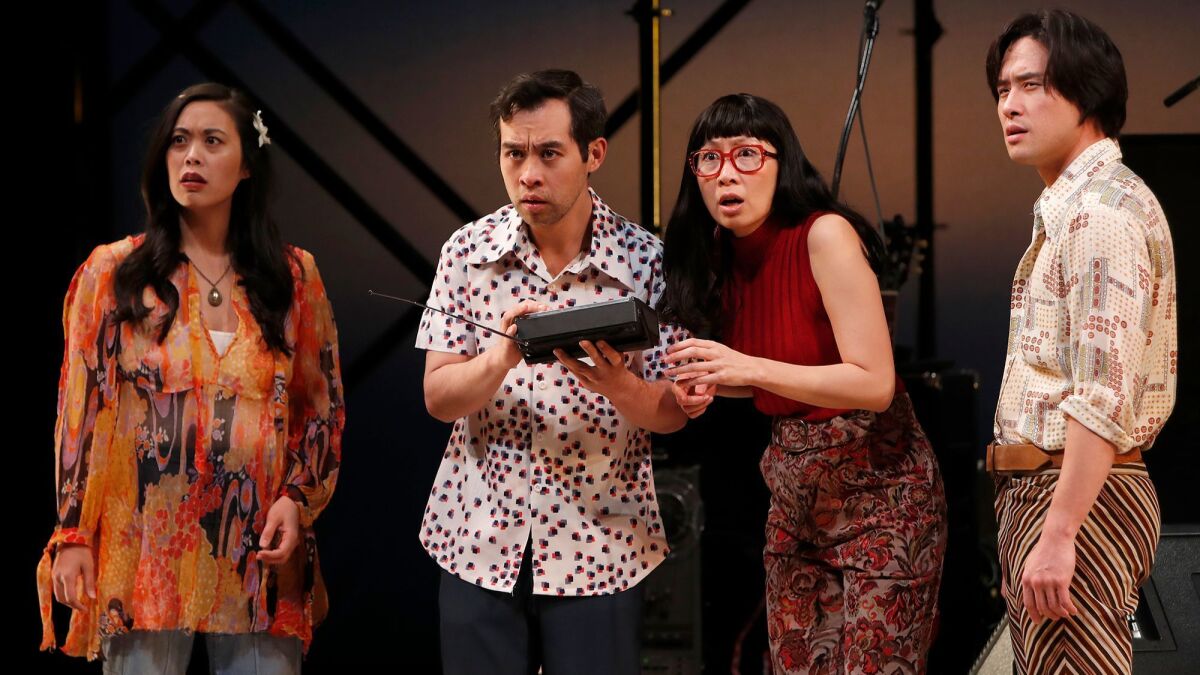 From left, Brooke Ishibashi, Joe Ngo, Jane Lui and Raymond Lee rehearse for “Cambodian Rock Band” at South Coast Repertory in Costa Mesa.