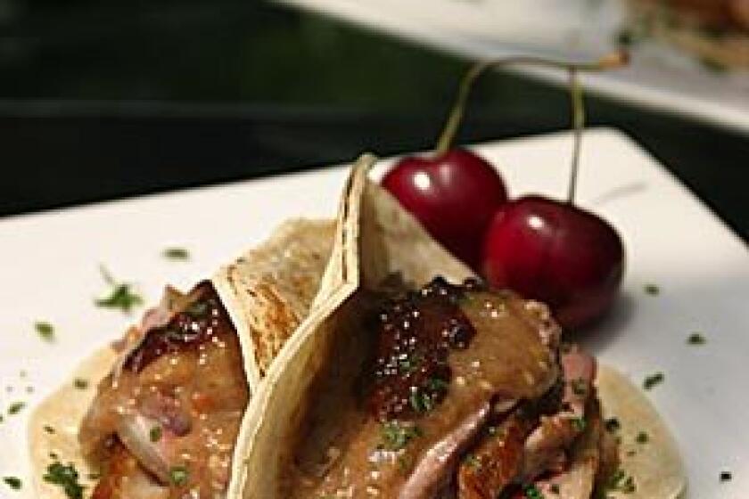 Duck tacos with a cherry compote.