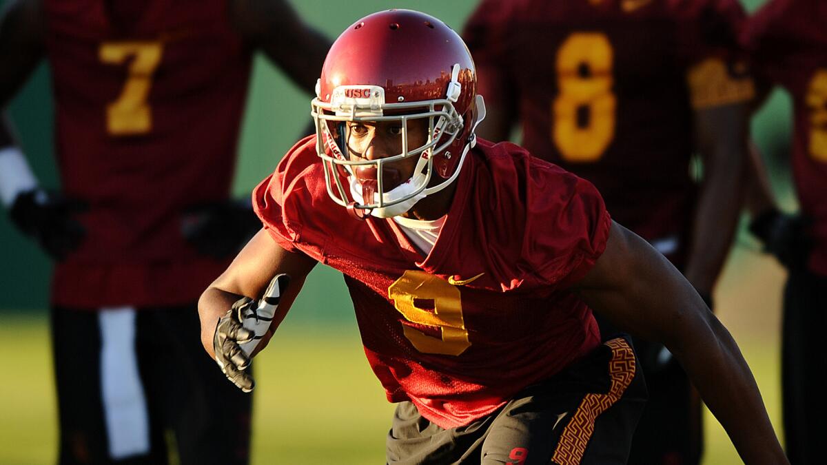 USC wide receiver JuJu Smith takes part in a team practice session on Aug. 4. Smith, a freshman, scored on a kickoff return in Monday's scrimmage.