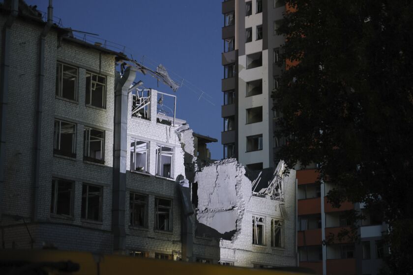 This shows a building damaged by a drone, that was shot down during a Russian overnight strike, in Kyiv, Ukraine, Thursday, June 1, 2023. (AP Photo/Alex Babenko)