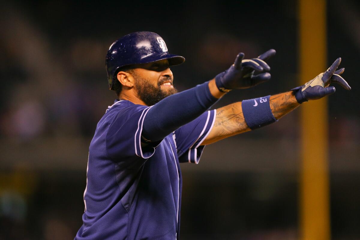 Padres' Matt Kemp celebrates his RBI triple to complete hitting for the cycle against Colorado on Aug. 14, 2015.