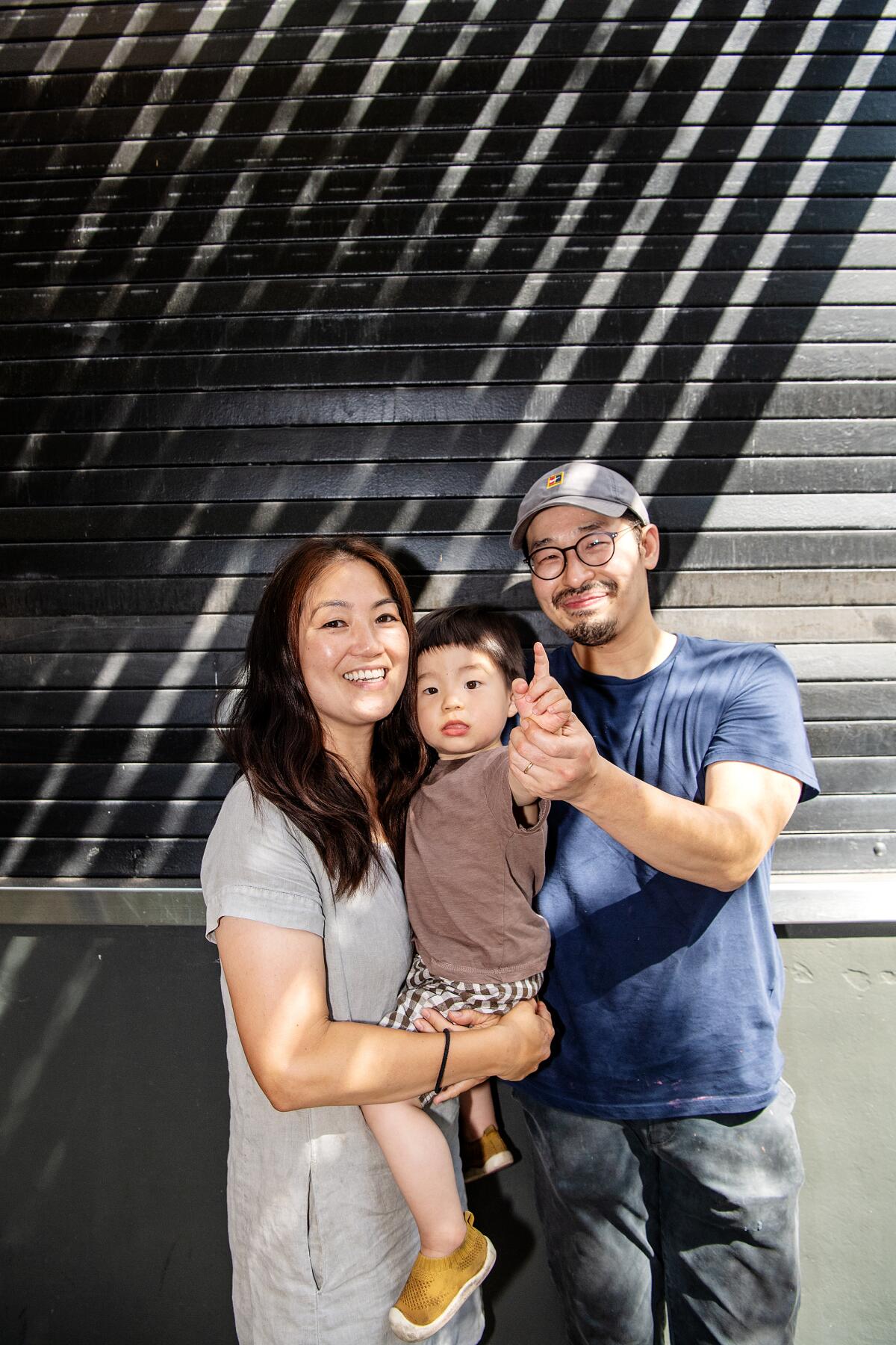 Shiku owners Kwang Uh and Mina Park, with their son, Taehoon.