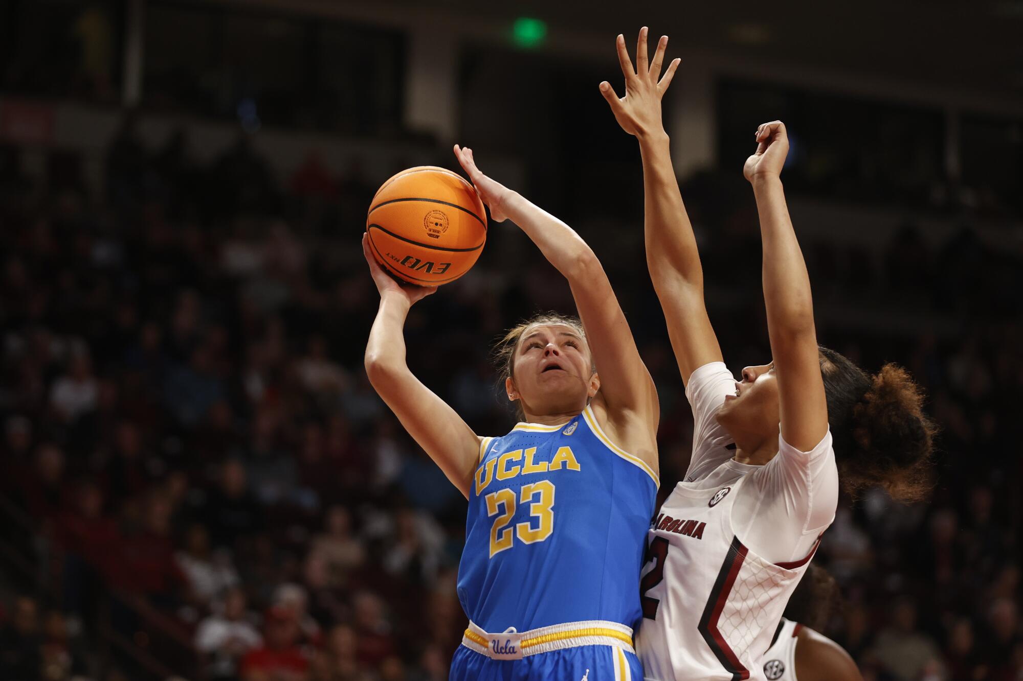 UCLA forward Gabriela Jaquez shoots against South Carolina guard Brea Beal.