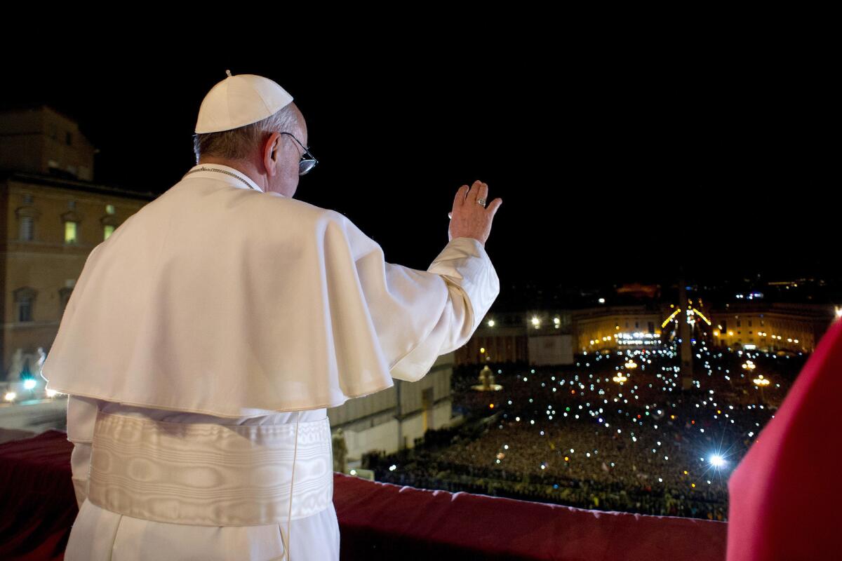 Newly elected Pope Francis appears on the central balcony of St Peter's Basilica in Vatican City. Argentinian Cardinal Jorge Mario Bergoglio was elected as the 266th Pontiff and will lead the world's 1.2 billion Catholics.