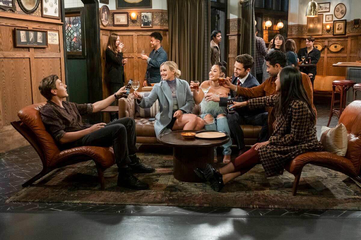 A group of friends drinking at a bar