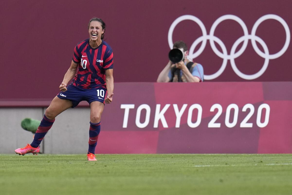 U.S. forward Carli Lloyd celebrates after scoring against Australia in the first half.