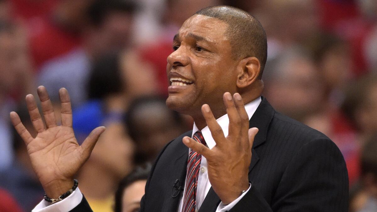 Clippers Coach Doc Rivers gestures during a playoff game against the Golden State Warriors on May 3. Rivers may be looking to trade the team's first-round draft pick.