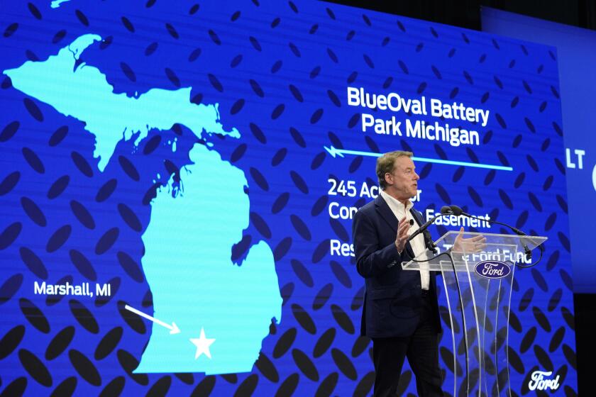 FILE - Ford Motor Co. Executive Chairman Bill Ford announces the automaker's new BlueOval Battery Park, Feb. 13, 2023, in Romulus, Mich. Ford Motor Co. said Monday, Sept. 25, that it's pausing construction of the $3.5 billion electric vehicle battery plant in Michigan until it is confident it can run the factory competitively. (AP Photo/Carlos Osorio, File)