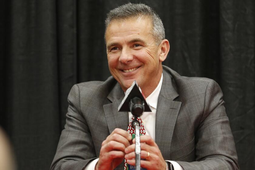 FILE - Ohio State NCAA college football head coach Urban Meyer answers questions during a news conference announcing his retirement in Columbus, Ohio, in this Tuesday, Dec. 4, 2018, file photo. A person familiar with the search says Urban Meyer and the Jacksonville Jaguars are working toward finalizing a deal to make him the team's next head coach. The person spoke to The Associated Press on the condition of anonymity Thursday, Jan. 14, 2021, because a formal agreement was not yet in place. (AP Photo/Jay LaPrete, File)