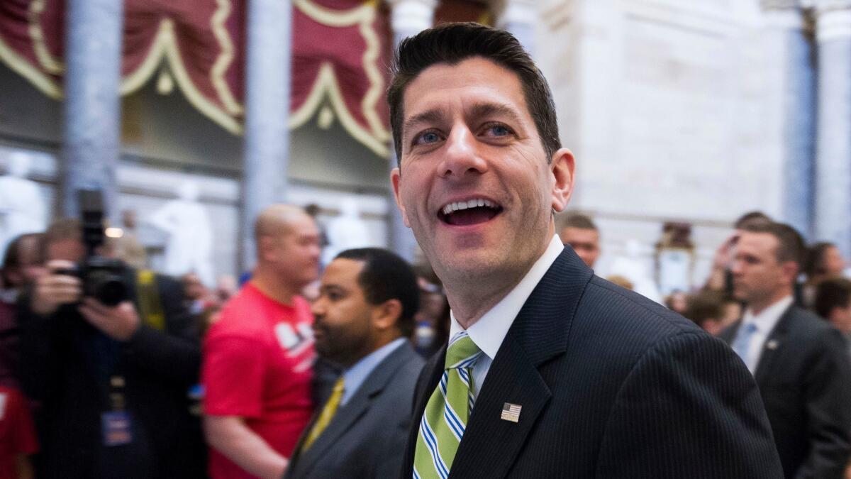 House Speaker Paul D. Ryan (R-Wis.) walks to his office in the U.S. Capitol on Friday. (Cliff Owen / Associated Press)