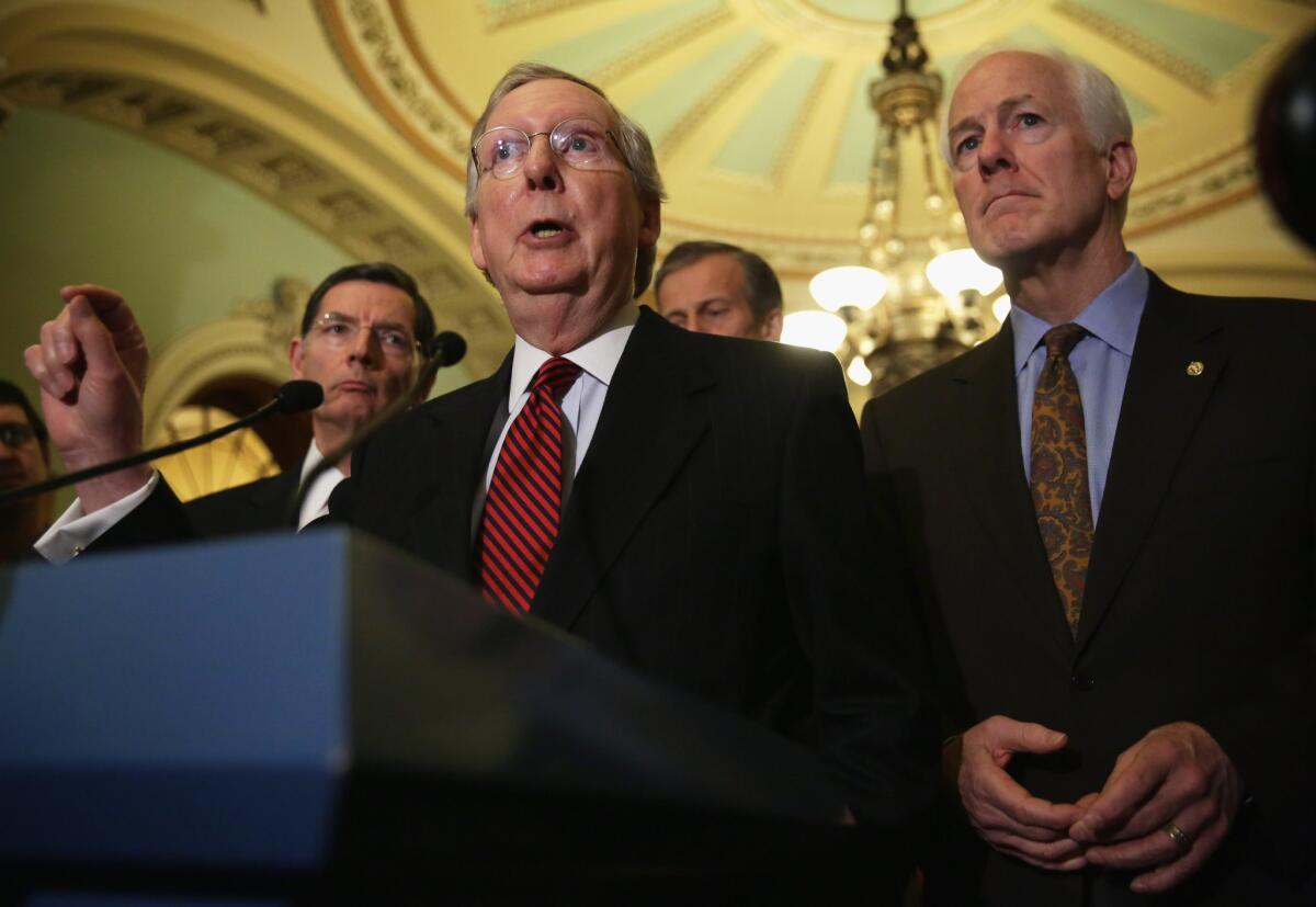 Senate Majority Leader Mitch McConnell (R-Ky.) addresses reporters on Capitol Hill.