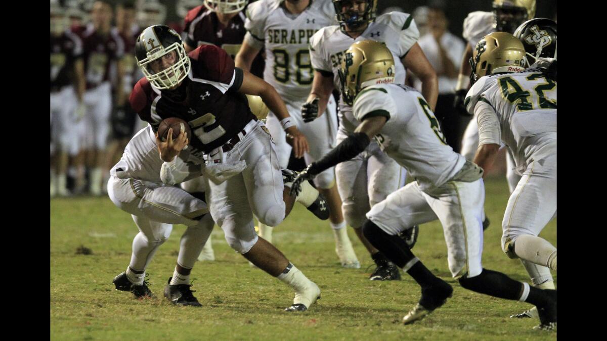 Quarterback Nick Robinson, breaking into the St. Bonaventure secondary on a run during a game earlier this season, and JSerra are in position to earn their first Pac-5 Division playoff berth after a 17-10 victory over Mater Dei.