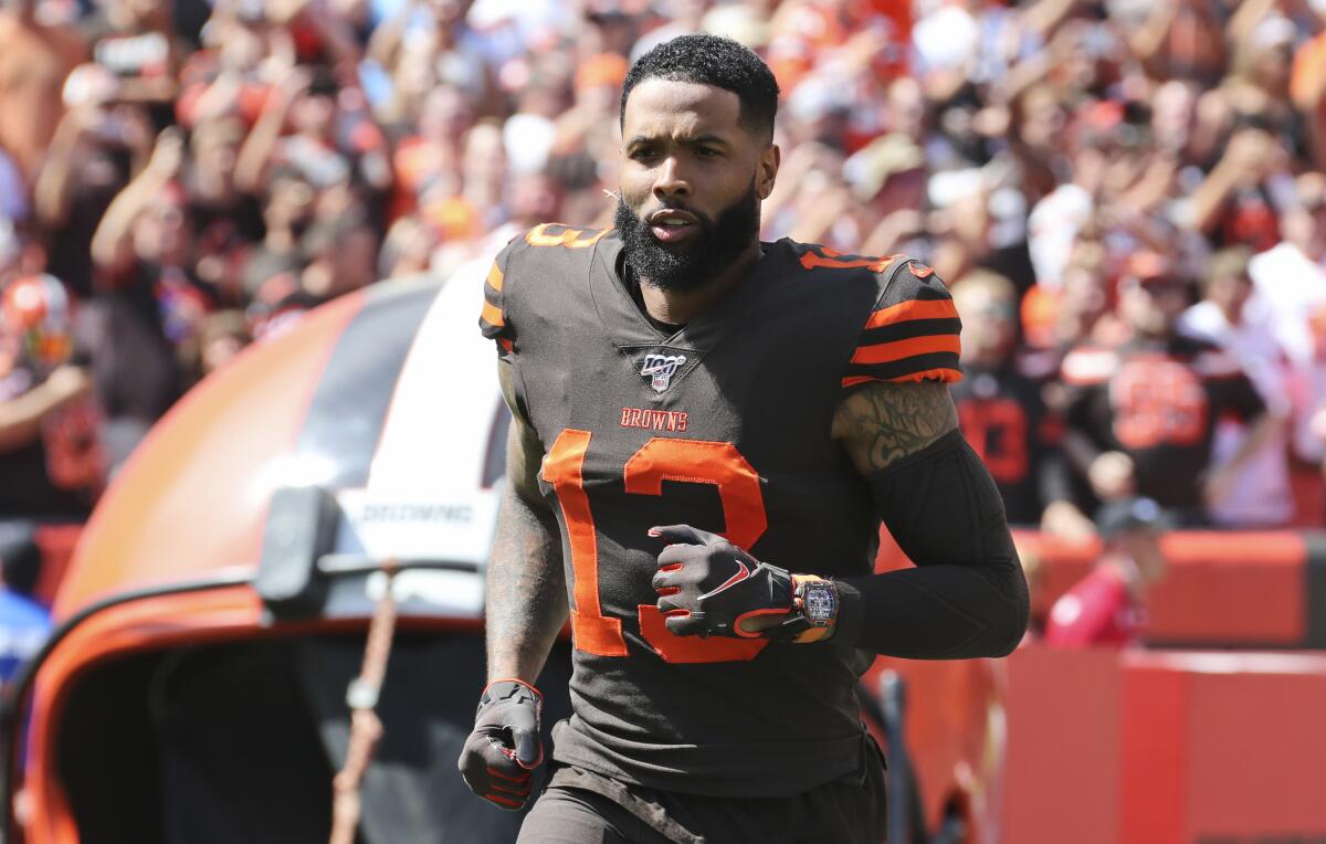Cleveland Browns wide receiver Odell Beckham Jr. takes the field before a game against the Tennessee Titans on Sept. 8. The designer watch remained on his wrist during the game.