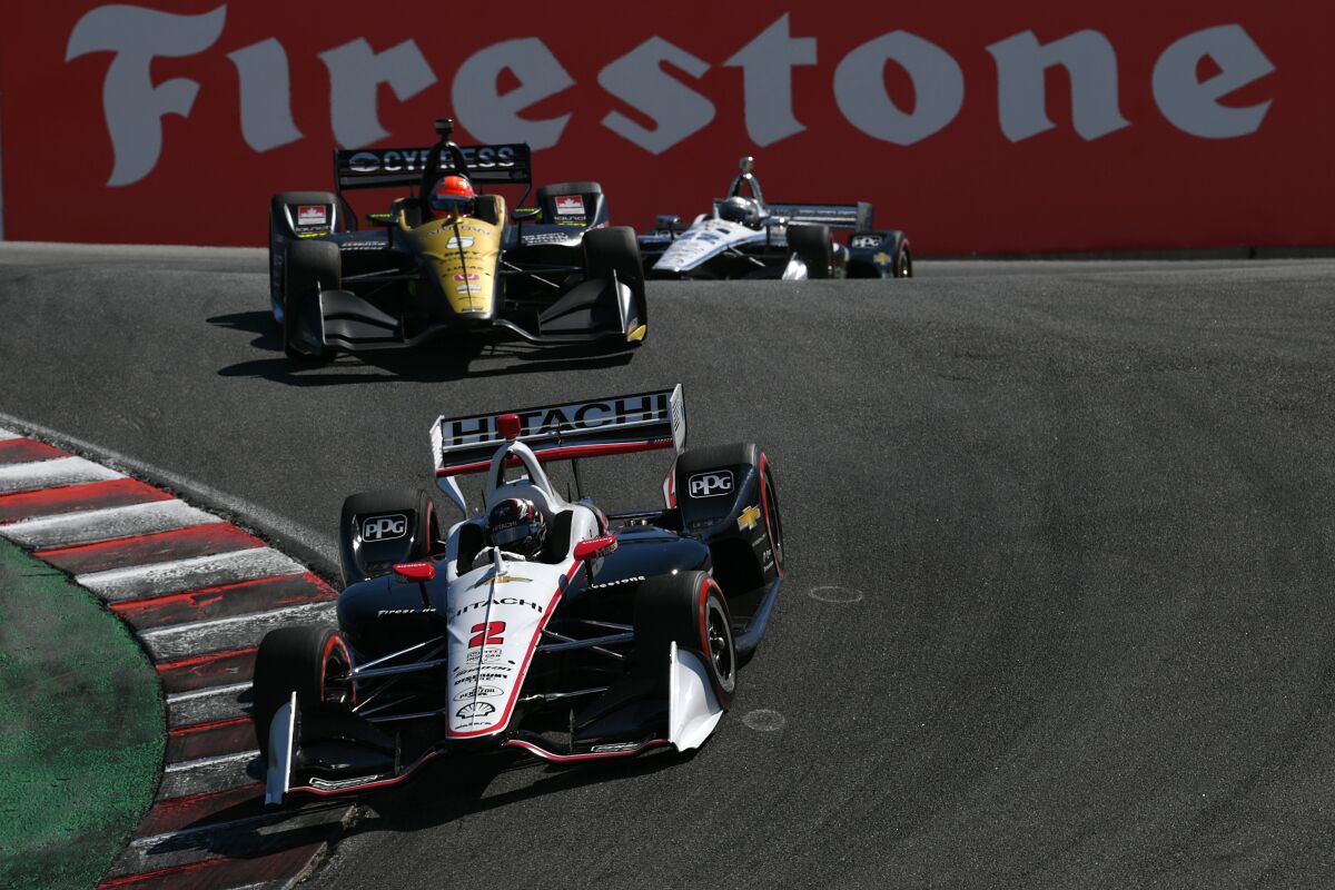 Josef Newgarden speeds through the corkscrew at Laguna Seca during the IndyCar Series finale on Sunday.