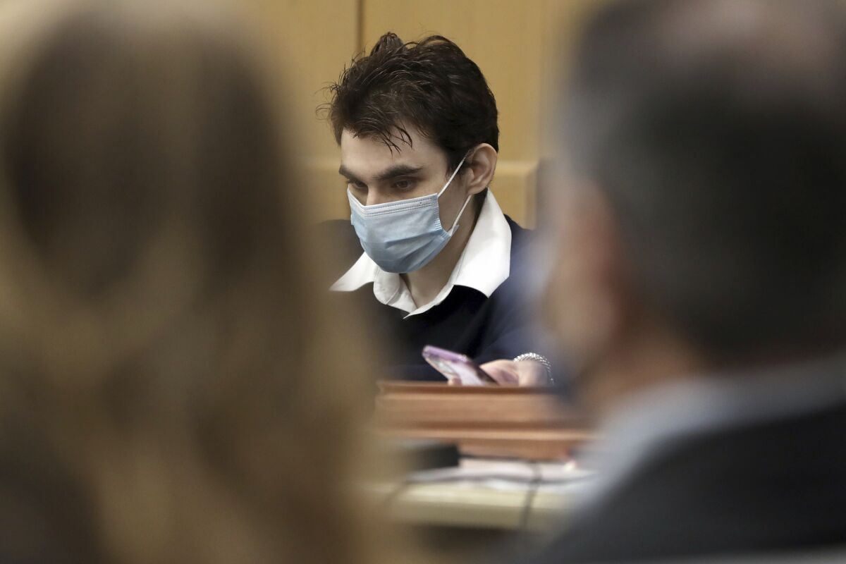 Parkland school shooter Nikolas Cruz is shown at the defense table at the Broward County Courthouse in Fort Lauderdale, Fla., on Monday, Oct. 4, 2021. (Amy Beth Bennett/South Florida Sun Sentinel via AP, Pool)