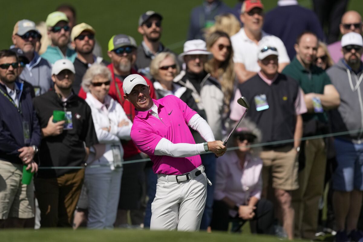 Rory McIlroy, of Northern Ireland chips to the second green during the second round at the Masters golf tournament on Friday, April 8, 2022, in Augusta, Ga. (AP Photo/Matt Slocum)
