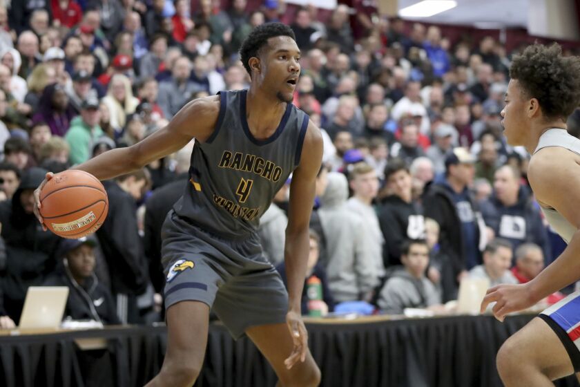 Rancho Christian's Evan Mobley #4 in action against DeMatha during a high school basketball game at the Hoophall Classic, Monday, January 20, 2020, in Springfield, MA. DeMatha won the game. (AP Photo/Gregory Payan)