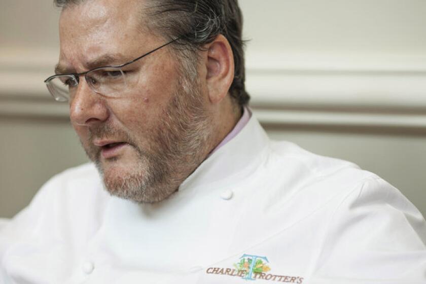 Charlie Trotter's death was not connected to a brain aneurysm and plane flights he'd taken, his wife says.