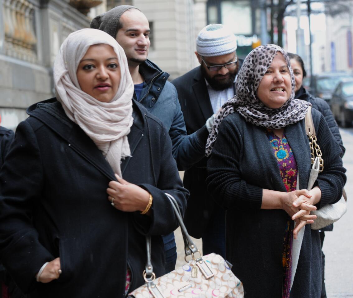 Left to right: Family friend Rabia Chaudry leaves Courthouse East with Yusuf Syed and Shamim Rahman, brother and mother of Adnan Syed.