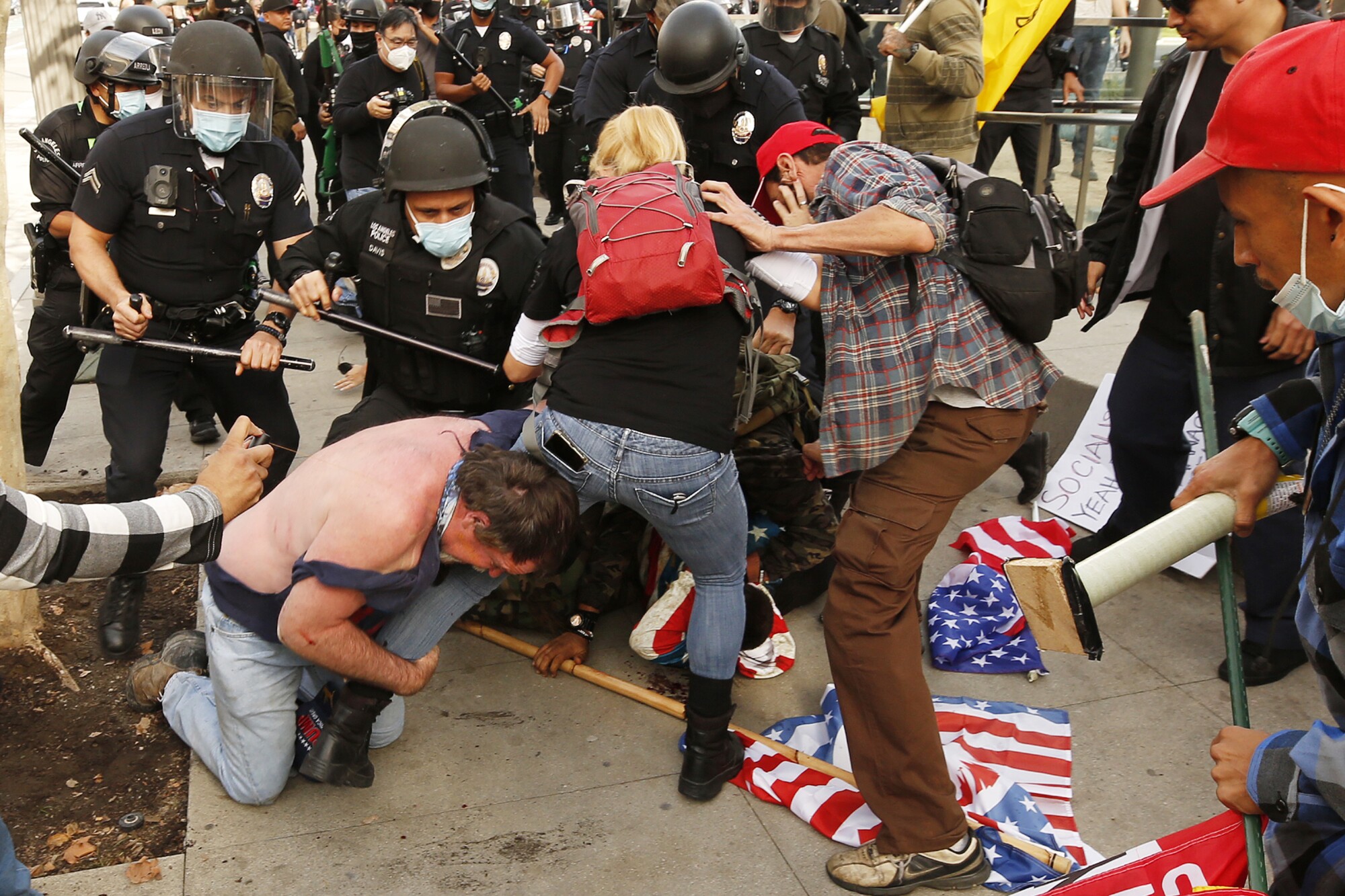 Photos | Trump supporters clash with police and counterprotesters in L.A. -  Los Angeles Times