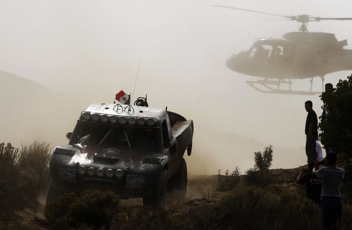 US' driver B.J. Baldwin steers his Trophy Truck during the 2008 Tecate Score Baja 1000 off-road race in the outskirts of Ensenada, Mexico, Friday, Nov. 21, 2008. (AP Photo/Guillermo Arias)