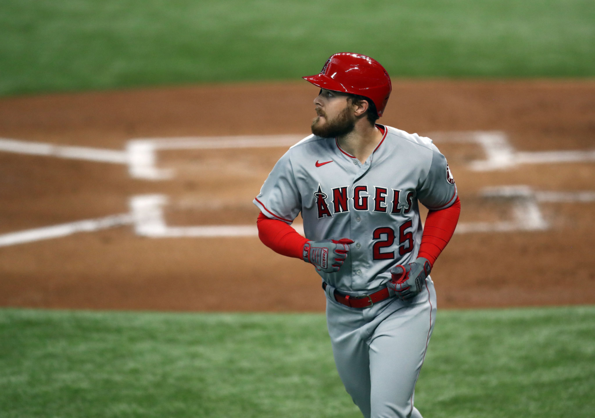 Angels first baseman Jared Walsh jogs back to the dugout after hitting a three-run home run against Texas on Sept. 10.