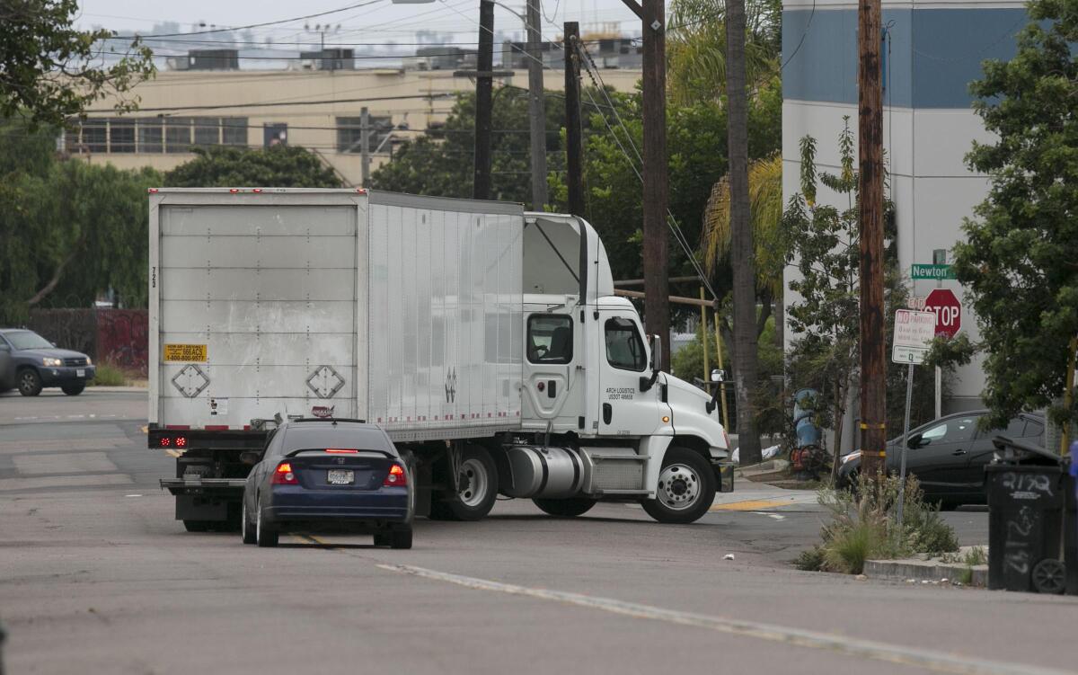 An 18 wheeler turned on to Newton street from 26th in the Barrio Logan neighborhood.